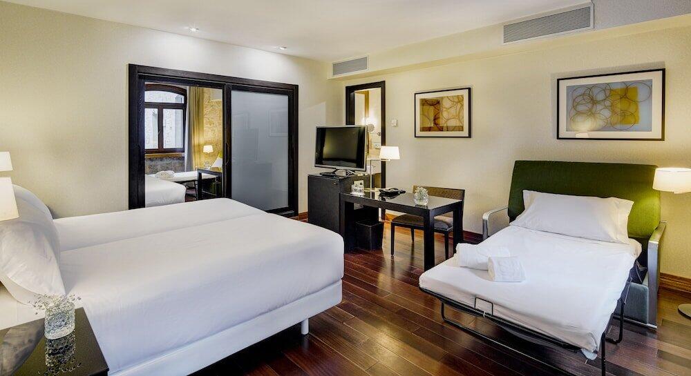 Foto de una habitación de Hotel Sercotel Puerta de la Catedral