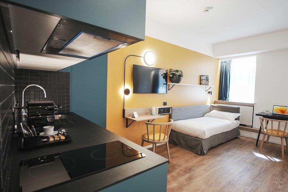 Foto de una habitación de Aparthotel Colombo Roma