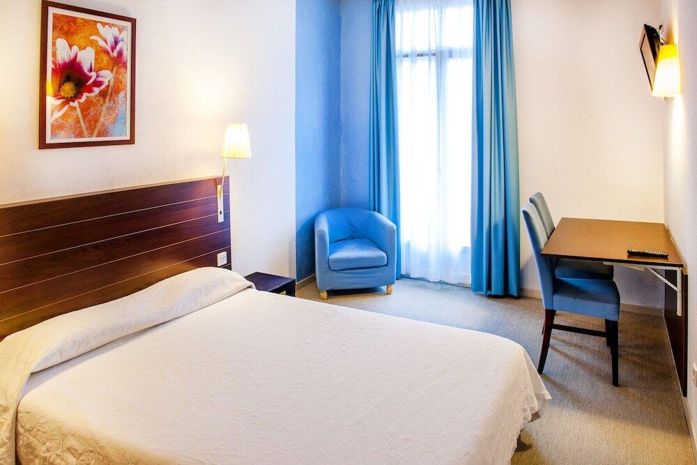 Foto de una habitación de Appart&amp;#039;hôtel Saint Jean