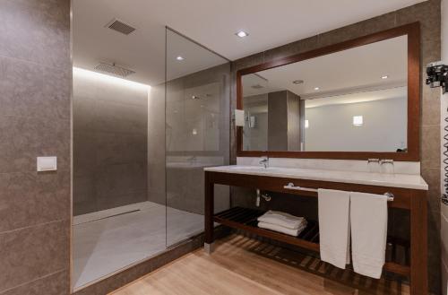 Foto del baño de Magnolia Hotel - Adults Only