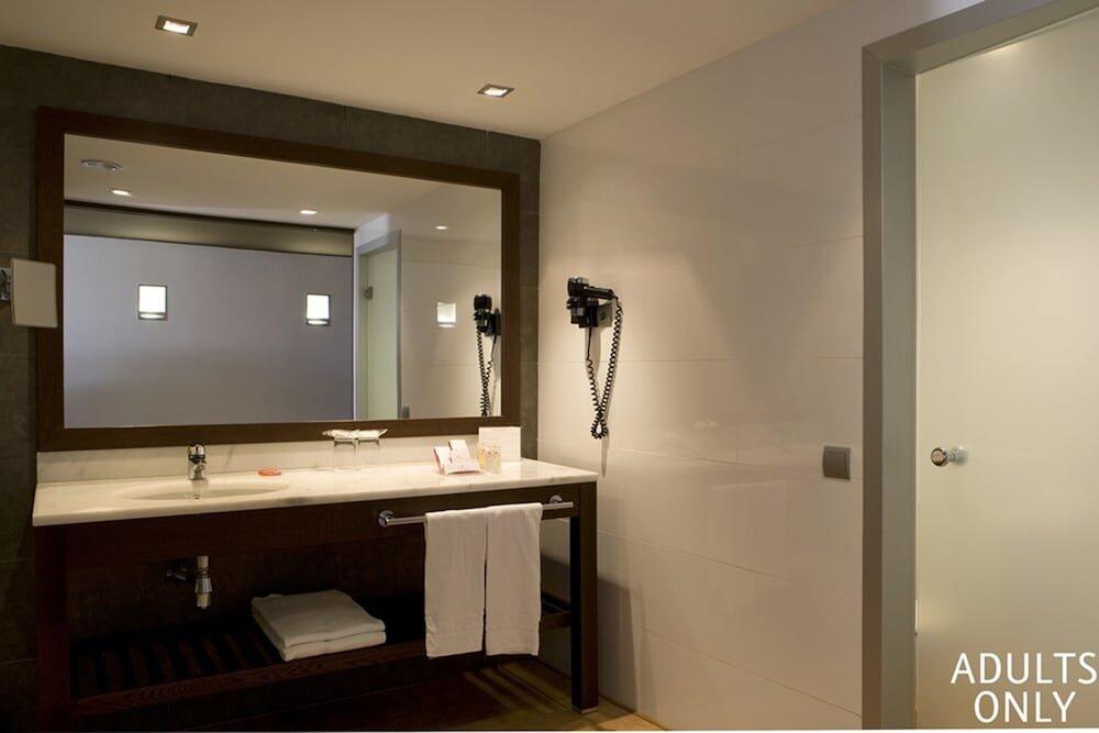 Foto del baño de Magnolia Hotel - Adults Only
