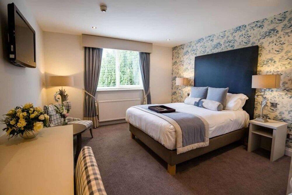 Foto de una habitación de Woughton House Hotel