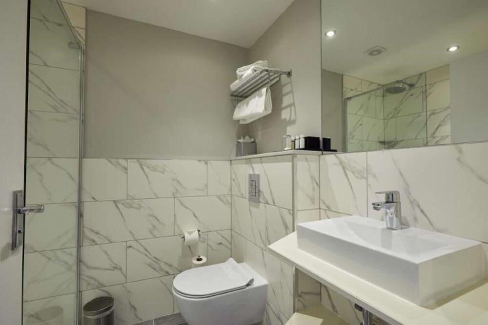 Foto de una habitación de Woughton House Hotel