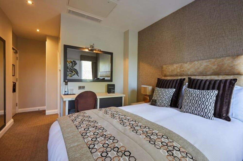 Foto de una habitación de Woughton House Hotel
