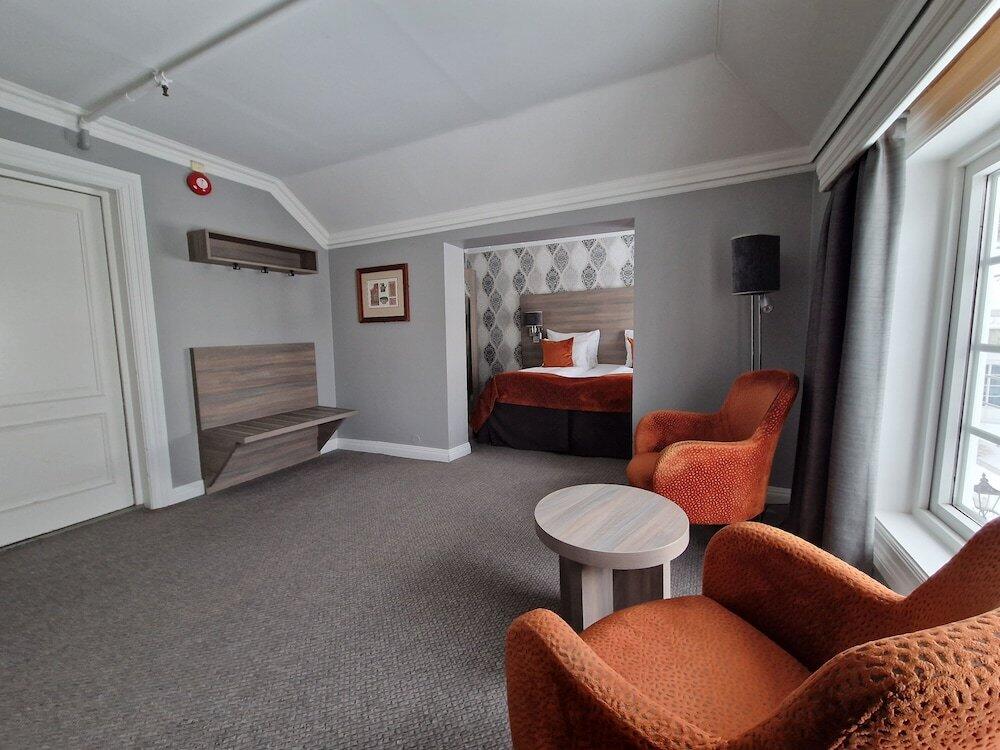 Foto de una habitación de Dr. Holms Hotel