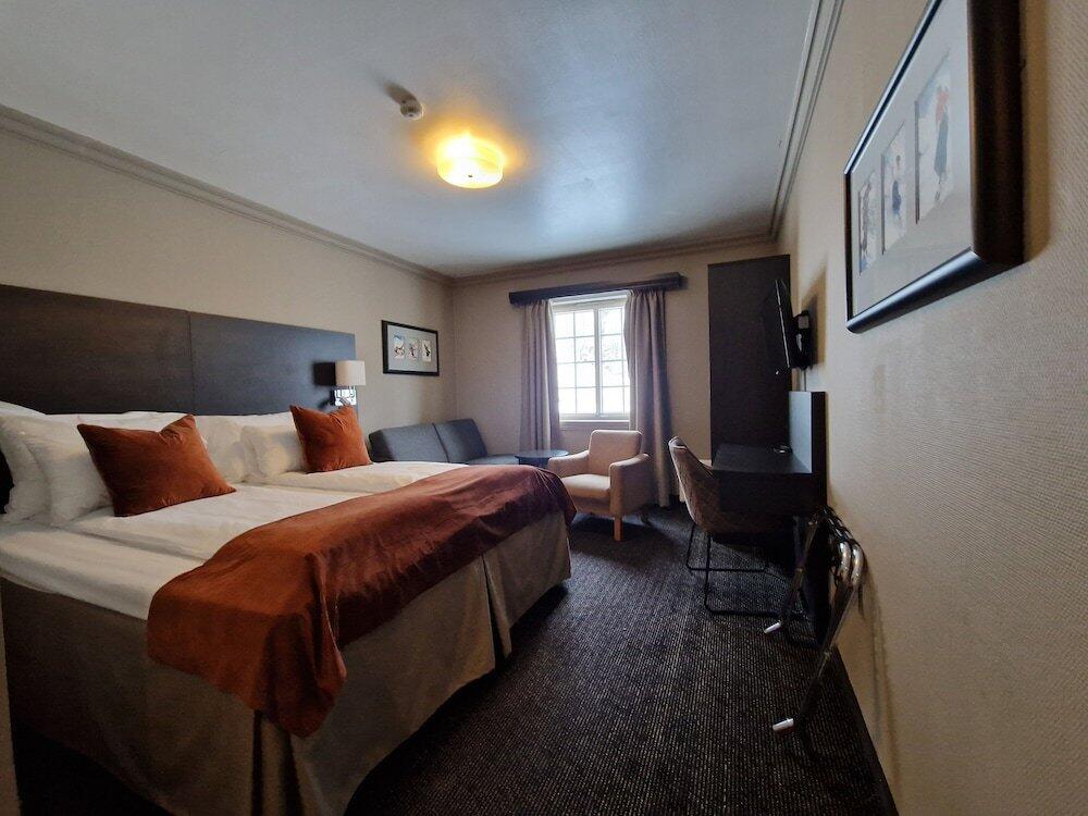 Foto de una habitación de Dr. Holms Hotel