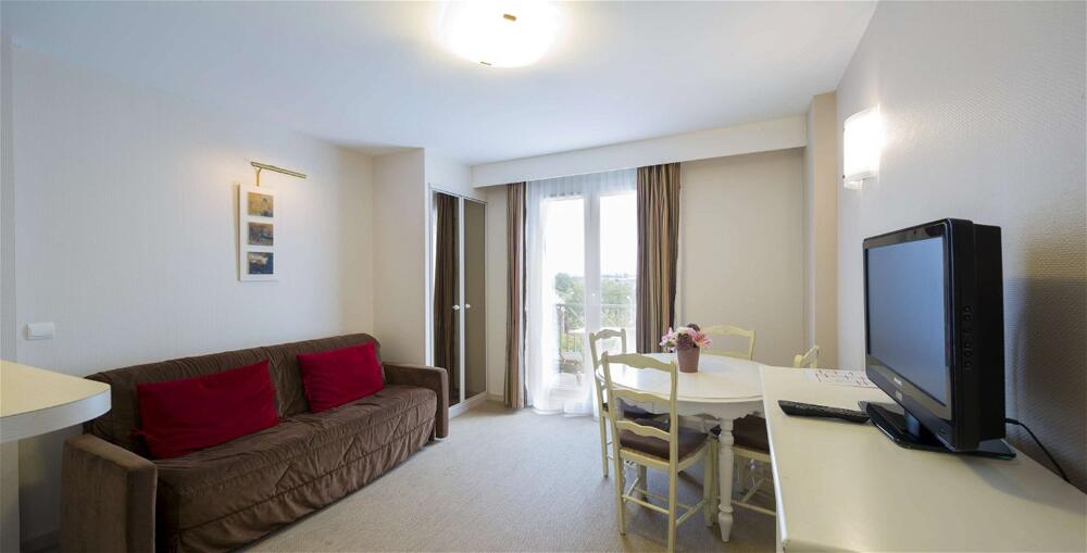 Foto de una habitación de Hotel Tulip Inn Honfleur Residence