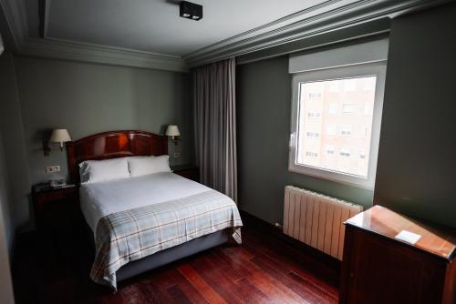 Foto de una habitación de Hotel Rice Reyes Católicos