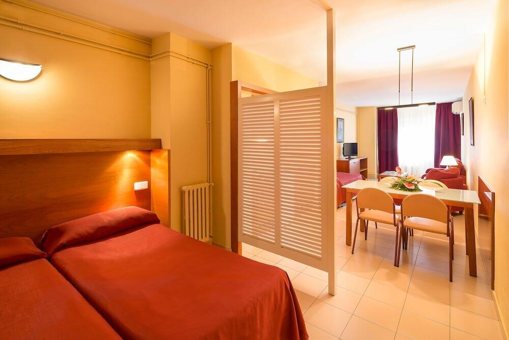 Foto de una habitación de Aparthotel Bertran