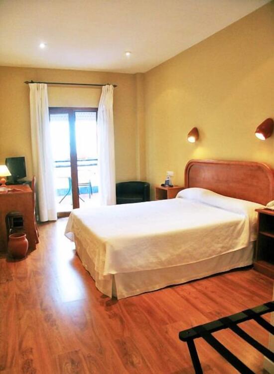 Foto de una habitación de Hotel Los Cantaros