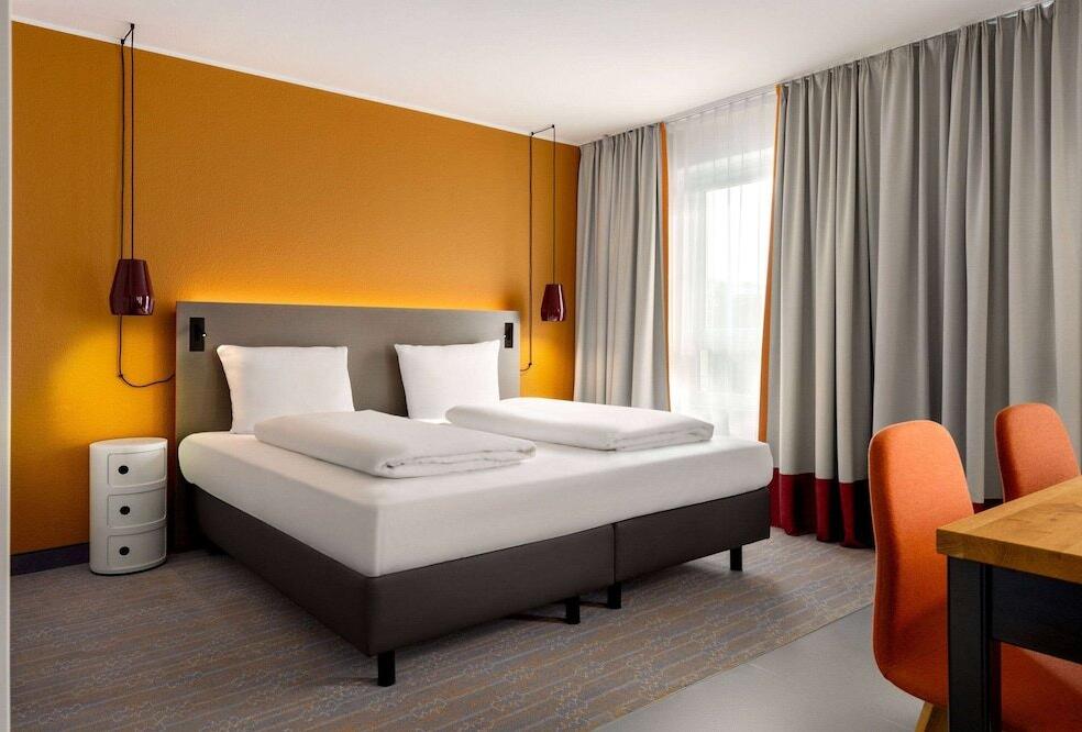 Foto de una habitación de Hotel Vienna House Easy by Wyndham Bad Oeynhausen