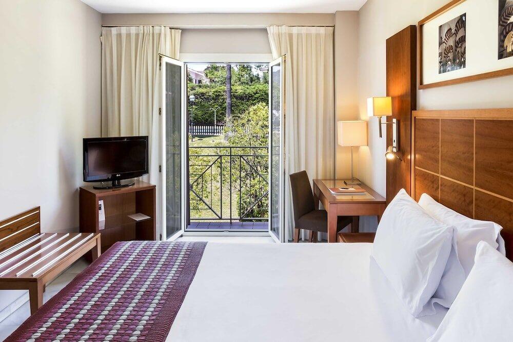 Foto de una habitación de Hotel Exe Las Adelfas