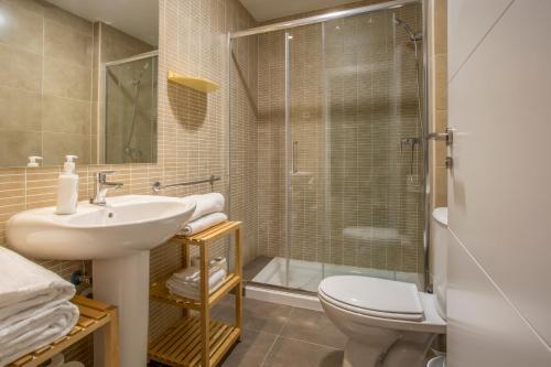 Foto del baño de Apartamentos Slow Suites Luchana