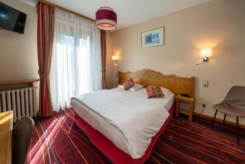 Foto de una habitación de Hôtel Du Parc &amp;amp; Spa et Wellness