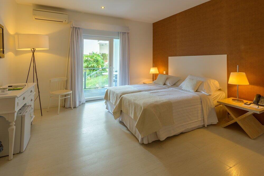 Foto de una habitación de Amazonia Estoril Hotel