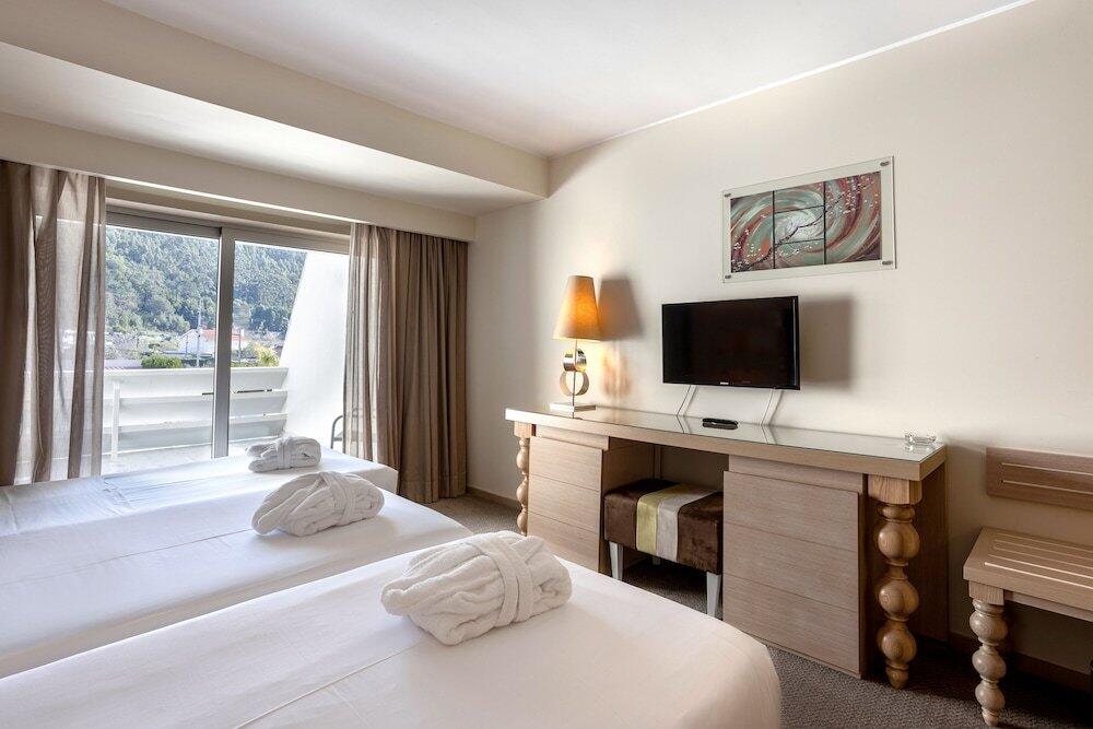 Foto de una habitación de Hotel Porta do Sol Conference &amp;amp; SPA