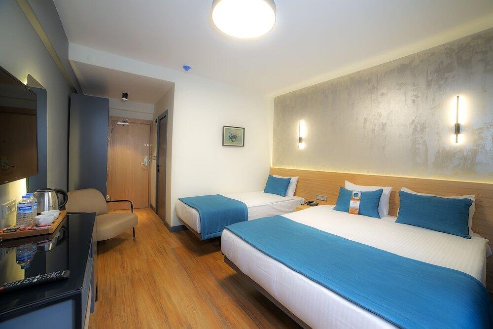 Foto de una habitación de Barin Hotel