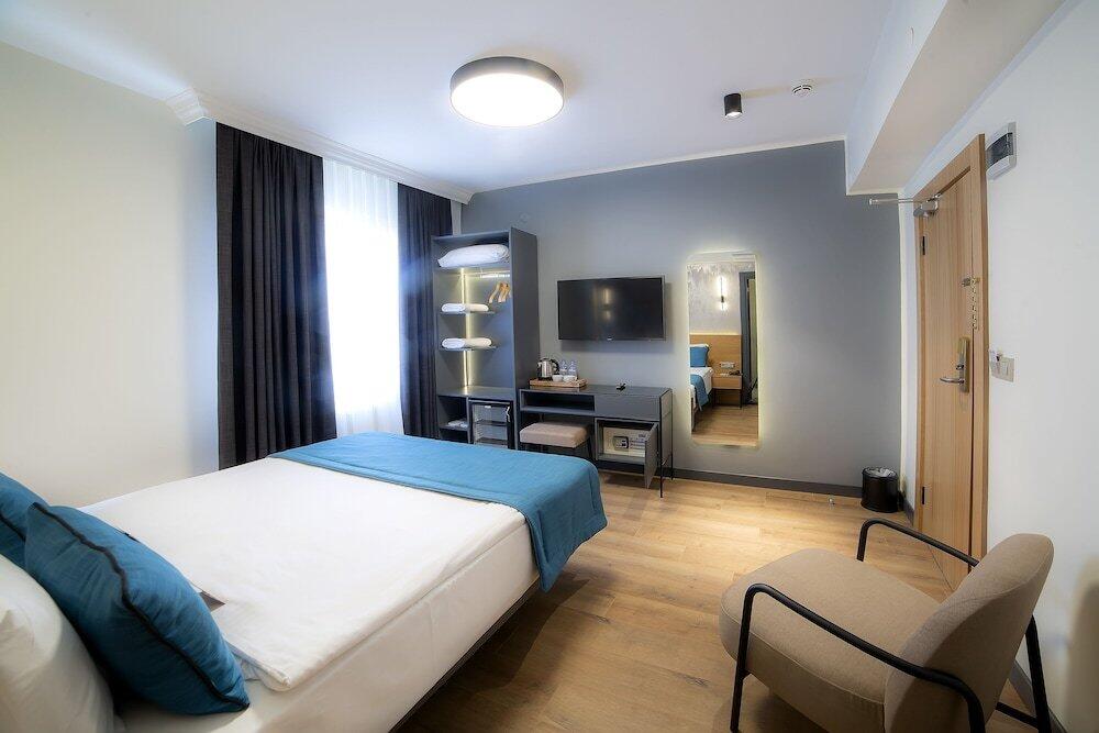 Foto de una habitación de Barin Hotel