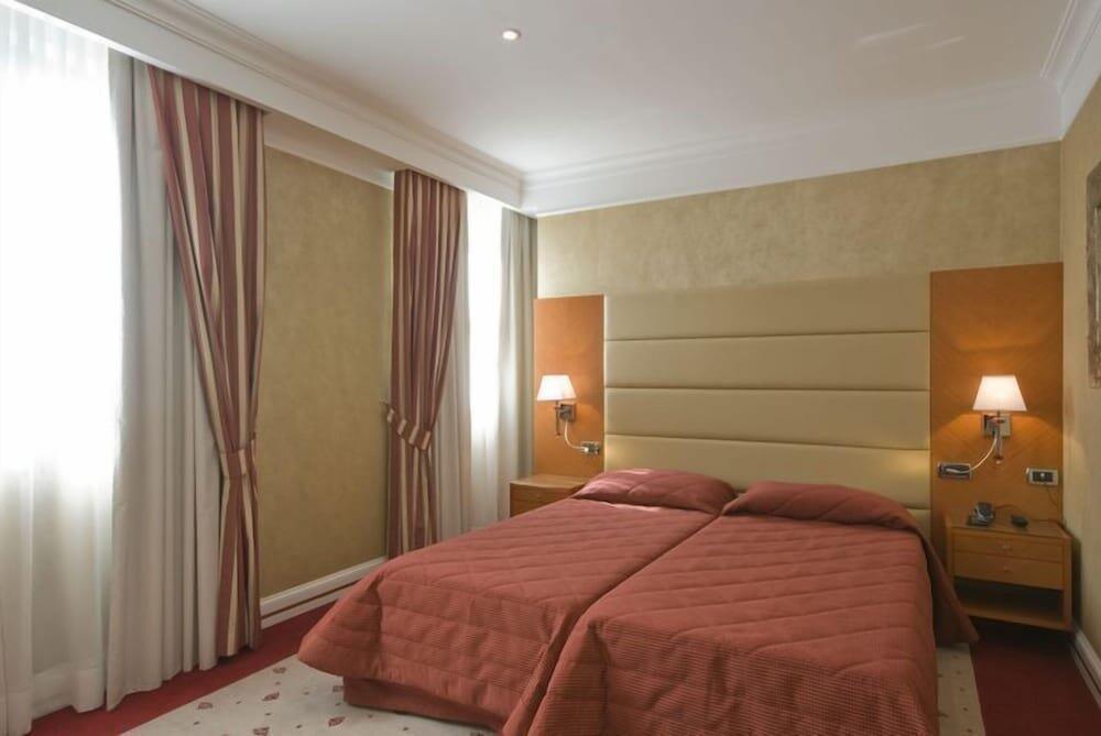 Foto de una habitación de Hotel Perusia