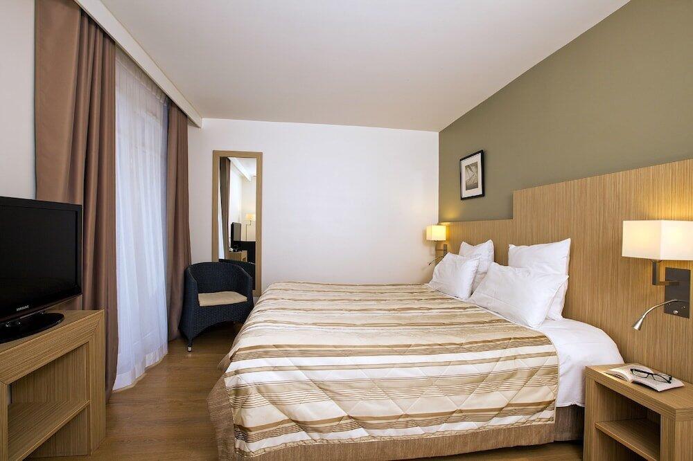 Foto de una habitación de Aparthotel Residhome Arcachon Plazza