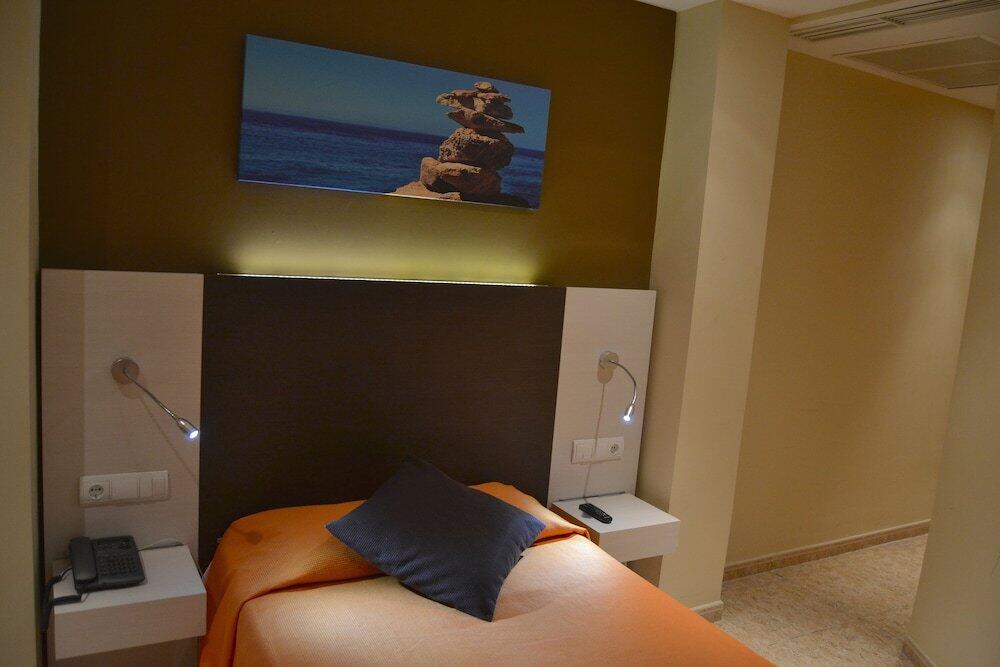 Foto de una habitación de Hotel Abelux