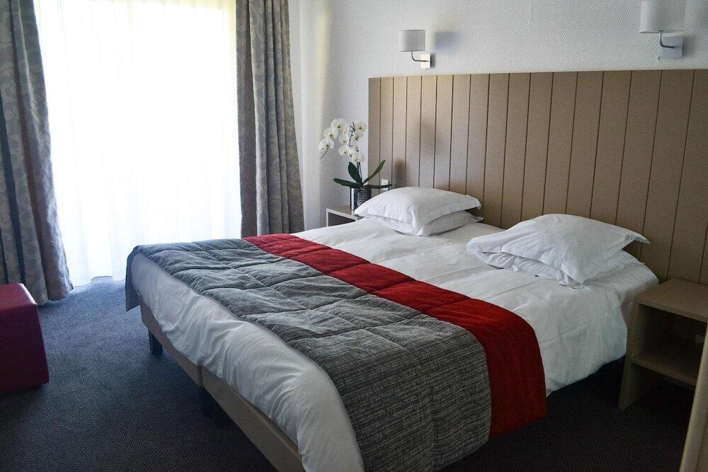 Foto de una habitación de Hôtel et Résidence de Chiberta et du Golf
