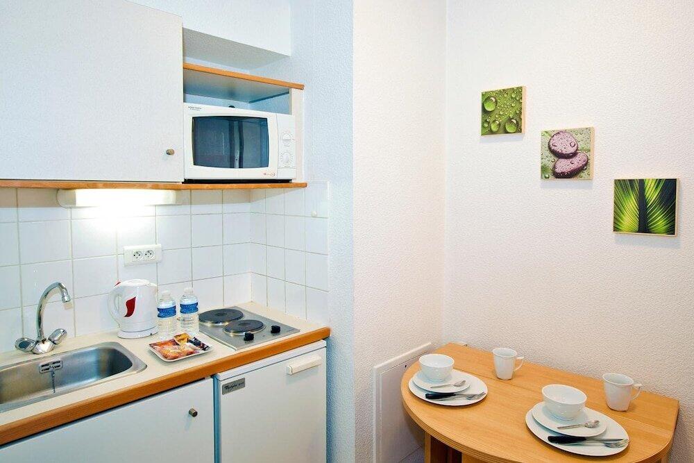 Foto de una habitación de Aparthotel Séjours &amp;amp; Affaires Rennes de Bretagne