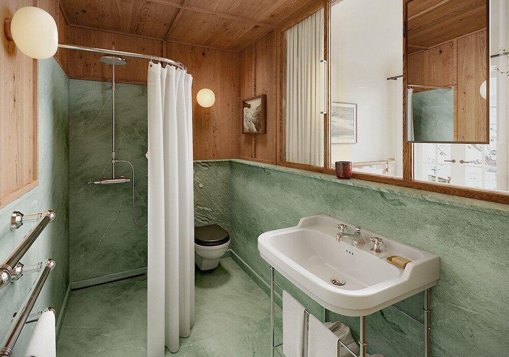 Foto del baño de Grand Hotel Belvedere, a Beaumier Hotel &amp;amp; Spa