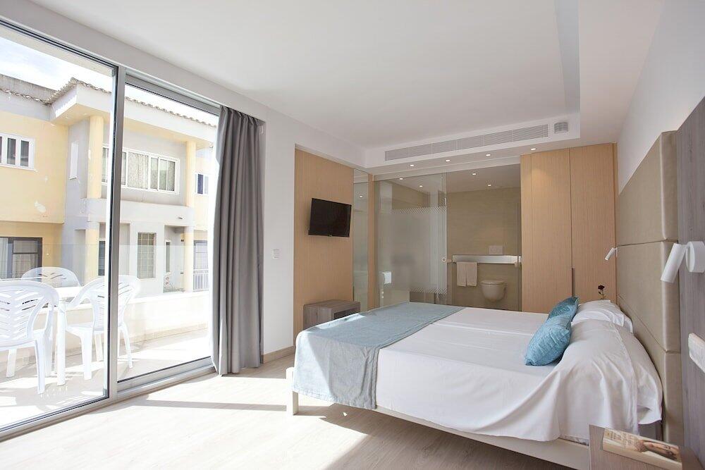 Foto de una habitación de Aparthotel Playa Dorada