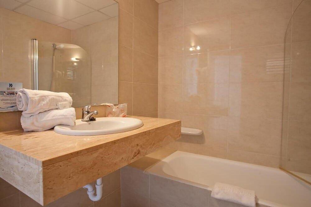 Foto del baño de Aparthotel Playa Dorada