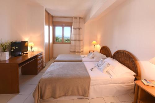 Foto de una habitación de Hotel Le Tilbury