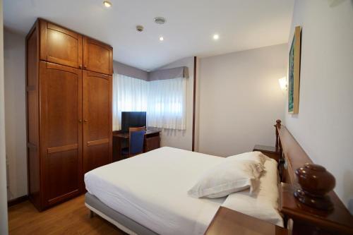 Foto de una habitación de Hotel Villalegre