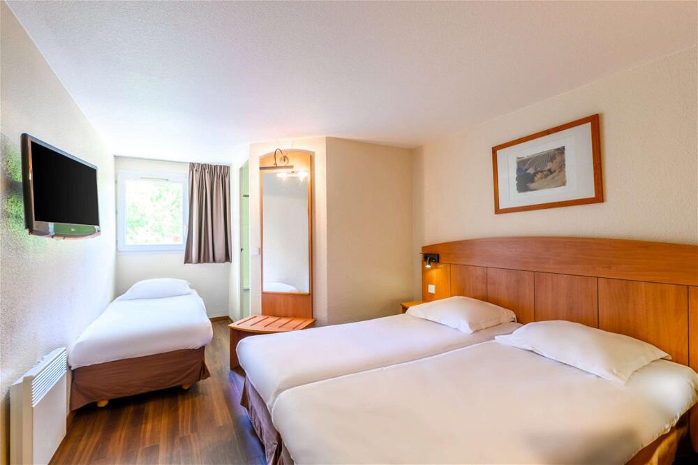 Foto de una habitación de Comfort Hotel Amiens Nord