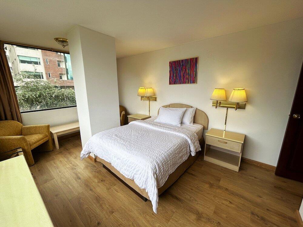 Foto de una habitación de Stanford Suites Hotel