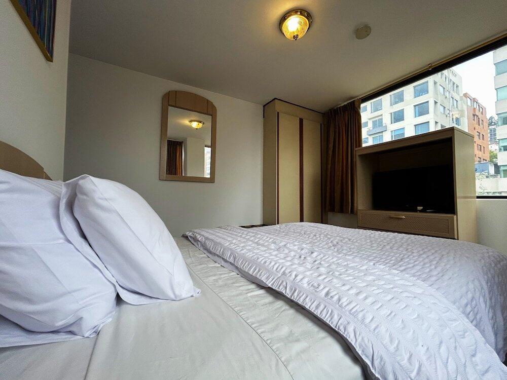 Foto de una habitación de Stanford Suites Hotel