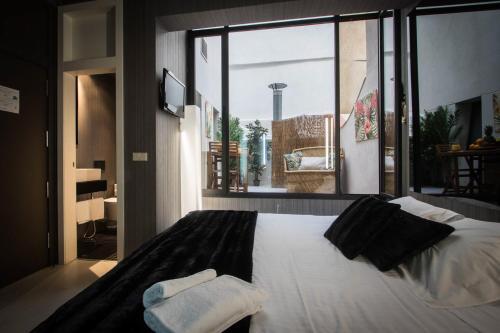 Foto de una habitación de Hotel Cosy Rooms Embajador