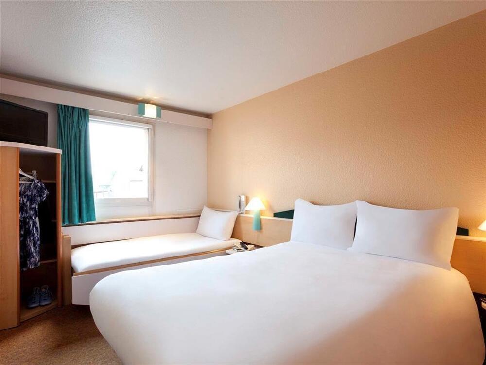 Foto de una habitación de Hotel ibis Lourdes Centre Gare