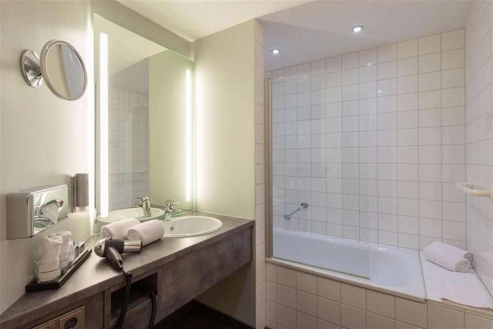 Foto del baño de Hotel Wolfsburg Centrum, Affiliated by Meliá