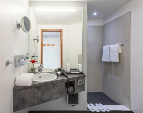 Foto del baño de Hotel Wolfsburg Centrum, Affiliated by Meliá