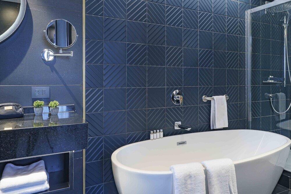 Foto del baño de Hotel Pullman Santiago El Bosque (Ex Atton)