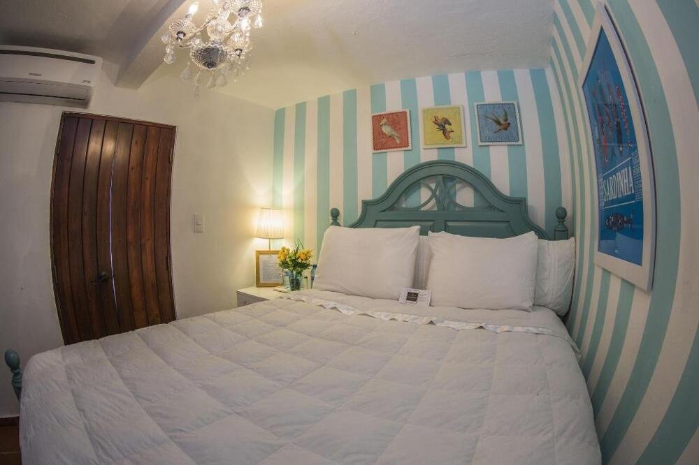 Foto de una habitación de Hotel Colonial 154 H Boutique
