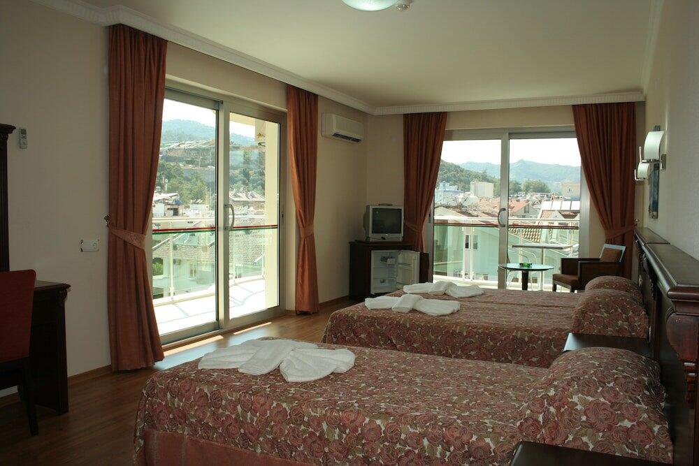 Foto de una habitación de Alkan Hotel