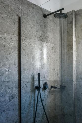 Foto del baño de Hotel Vrachos Suites Mykonos