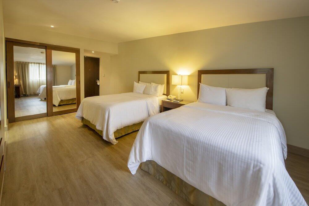 Foto de una habitación de Hotel Antaris Valle