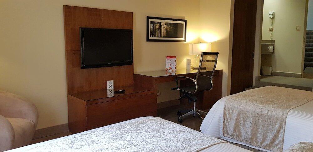 Foto de una habitación de Hotel Antaris Valle