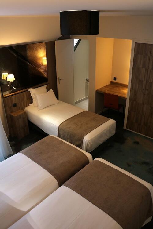 Foto de una habitación de Hotel Le Saint Aubert