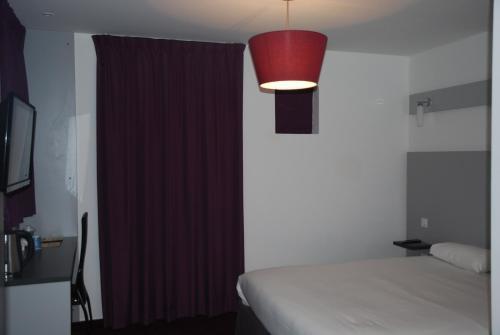Foto de una habitación de Kyriad Evreux - Netreville