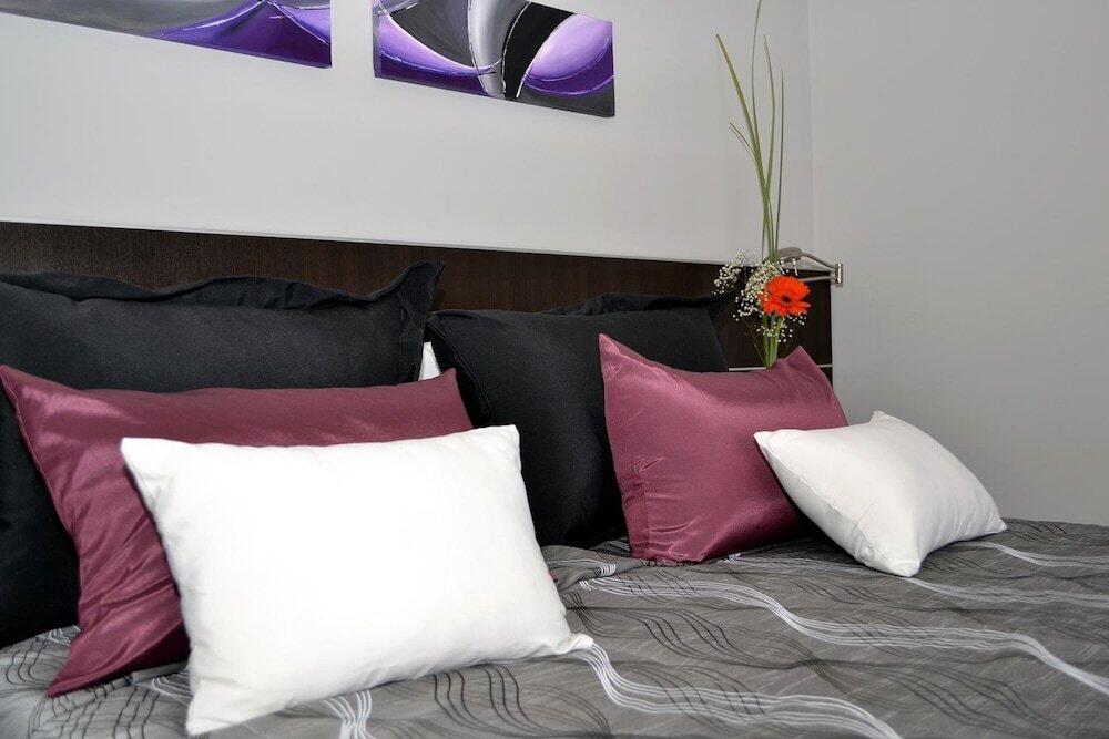 Foto de una habitación de Kube Apartments Express