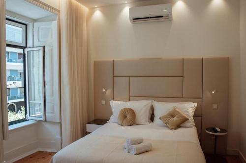 Foto de una habitación de Albergue Le Premier Lisbon Suites