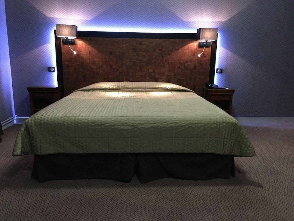 Foto de una habitación de Le Grand Hotel